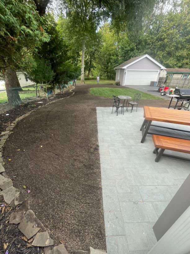 giving lawn the aeration treatment in pompton